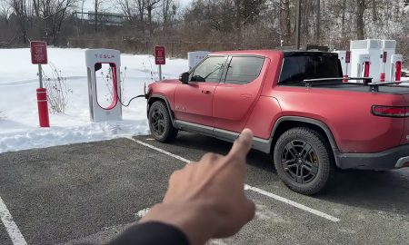 rivian charging at tesla supercharger