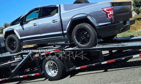 tesla cybertruck wrapped as an f-150